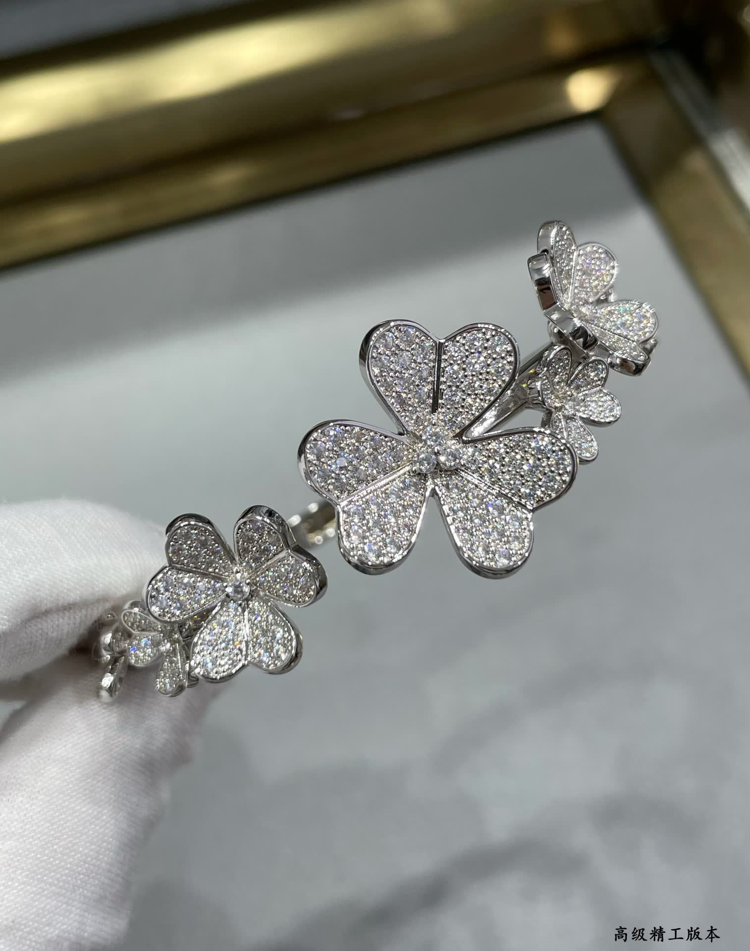 Van Cleef & Arpels Silver Flower Bracelet with Diamonds